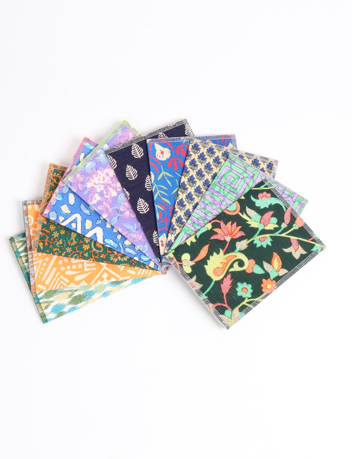 Set of 10 folded postcards with colorful floral and geometric patterns, shown fanned out on a white background
