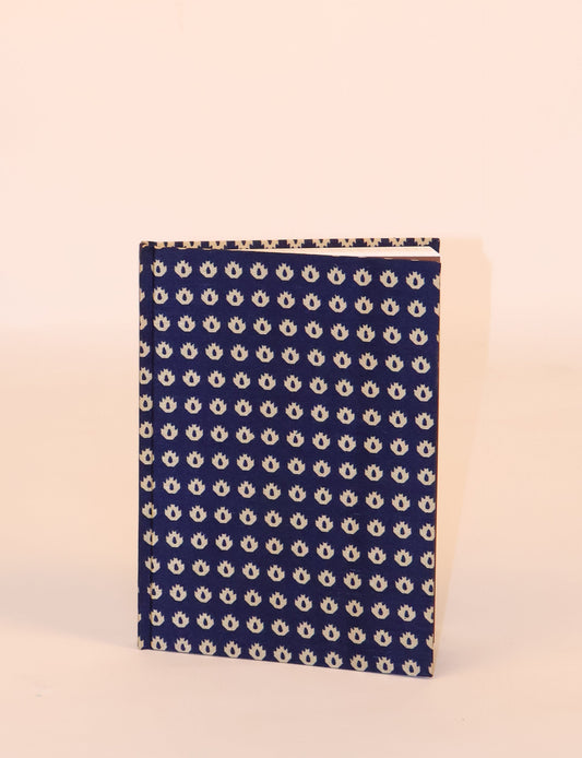 Elevate your scribbling experience with our A5 hardcover notebook, an epitome of green fashion. Sustainable and upcycled, this notebook features recycled fabric covers and aligns with the ethos of circular fashion. Dive into conscious living with our eco-friendly, recycled material notebook.