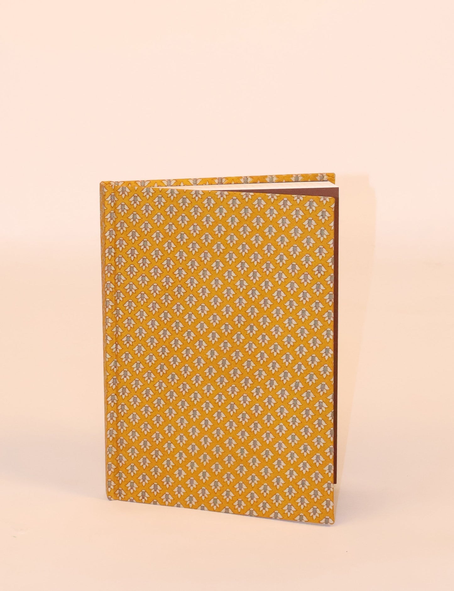 Elevate your scribbling experience with our A5 hardcover notebook, an epitome of green fashion. Sustainable and upcycled, this notebook features recycled fabric covers and aligns with the ethos of circular fashion. Dive into conscious living with our eco-friendly, recycled material notebook.