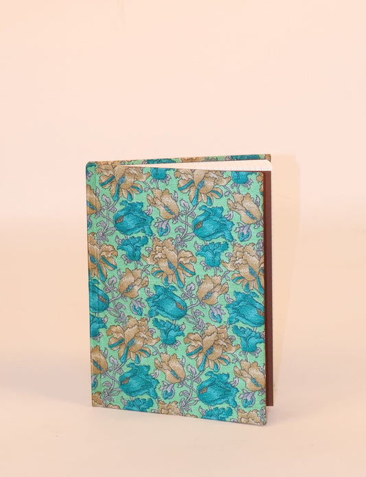 Elevate your scribbling experience with our A5 hardcover notebook, an epitome of green fashion. Sustainable and upcycled, this notebook features recycled fabric covers and aligns with the ethos of circular fashion. Dive into conscious living with our eco-friendly, recycled material notebook.