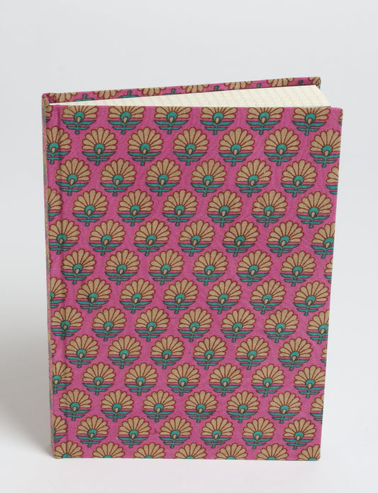 Elevate your scribbling experience with our A5 hardcover notebook, an epitome of green fashion. Sustainable and upcycled, this notebook features recycled fabric covers and aligns with the ethos of circular fashion. Dive into conscious living with our eco-friendly, recycled material notebook.