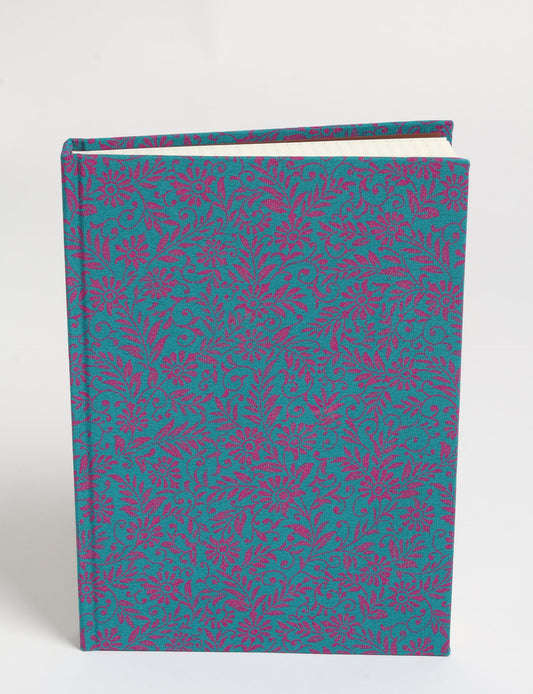 Elevate your scribbling experience with our A5 hardcover notebook, an epitome of green fashion. Sustainable and upcycled, this notebook features recycled fabric covers and aligns with the ethos of circular fashion. Dive into conscious living with our eco-friendly, recycled material notebook.