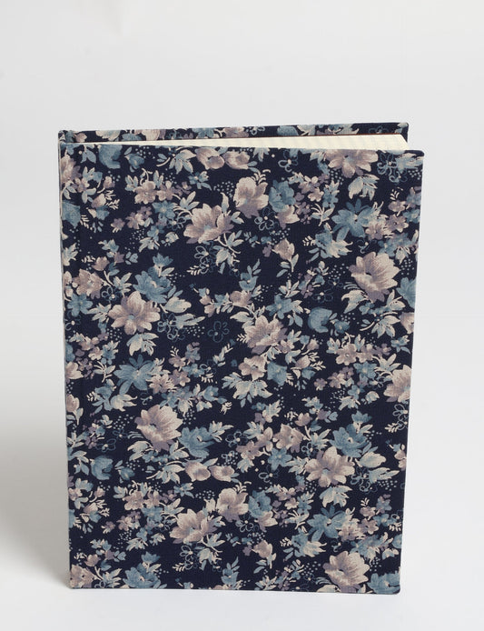 Elevate your scribbling experience with our A5 hardcover notebook, an epitome of green fashion. Sustainable and upcycled, this notebook features recycled fabric covers and aligns with the ethos of circular fashion. Dive into conscious living with our eco-friendly, recycled material notebook.