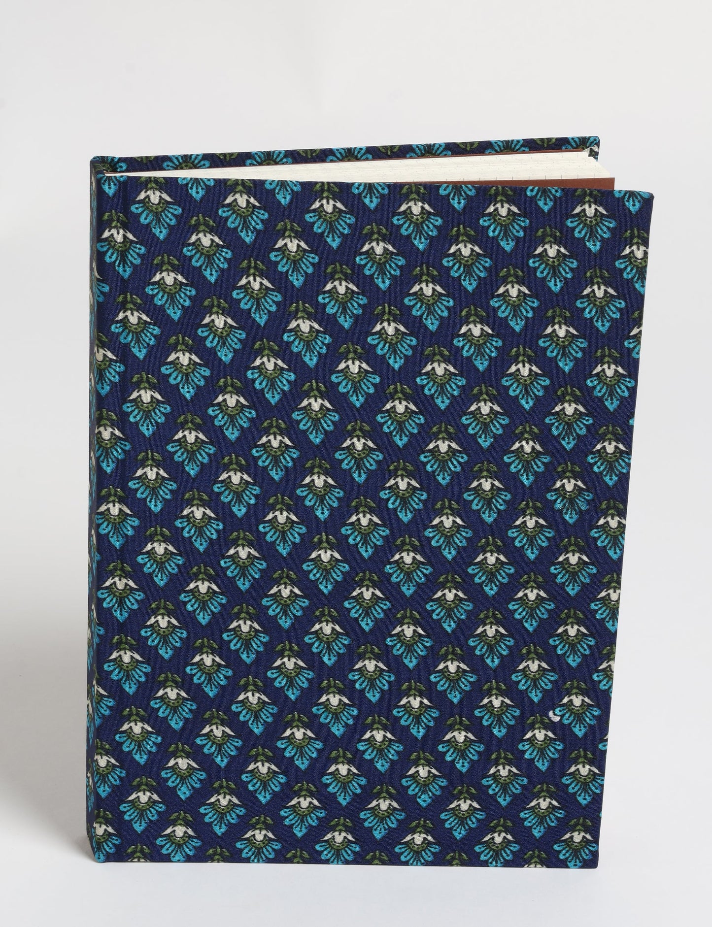 Elevate your scribbling experience with our A5 hardcover notebook, an epitome of green fashion. Sustainable and upcycled, this notebook features recycled fabric covers and aligns with the ethos of circular fashion. Dive into conscious living with our eco-friendly, recycled material notebook.