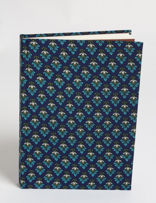 Elevate your scribbling experience with our A5 hardcover notebook, an epitome of green fashion. Sustainable and upcycled, this notebook features recycled fabric covers and aligns with the ethos of circular fashion. Dive into conscious living with our eco-friendly, recycled material notebook.