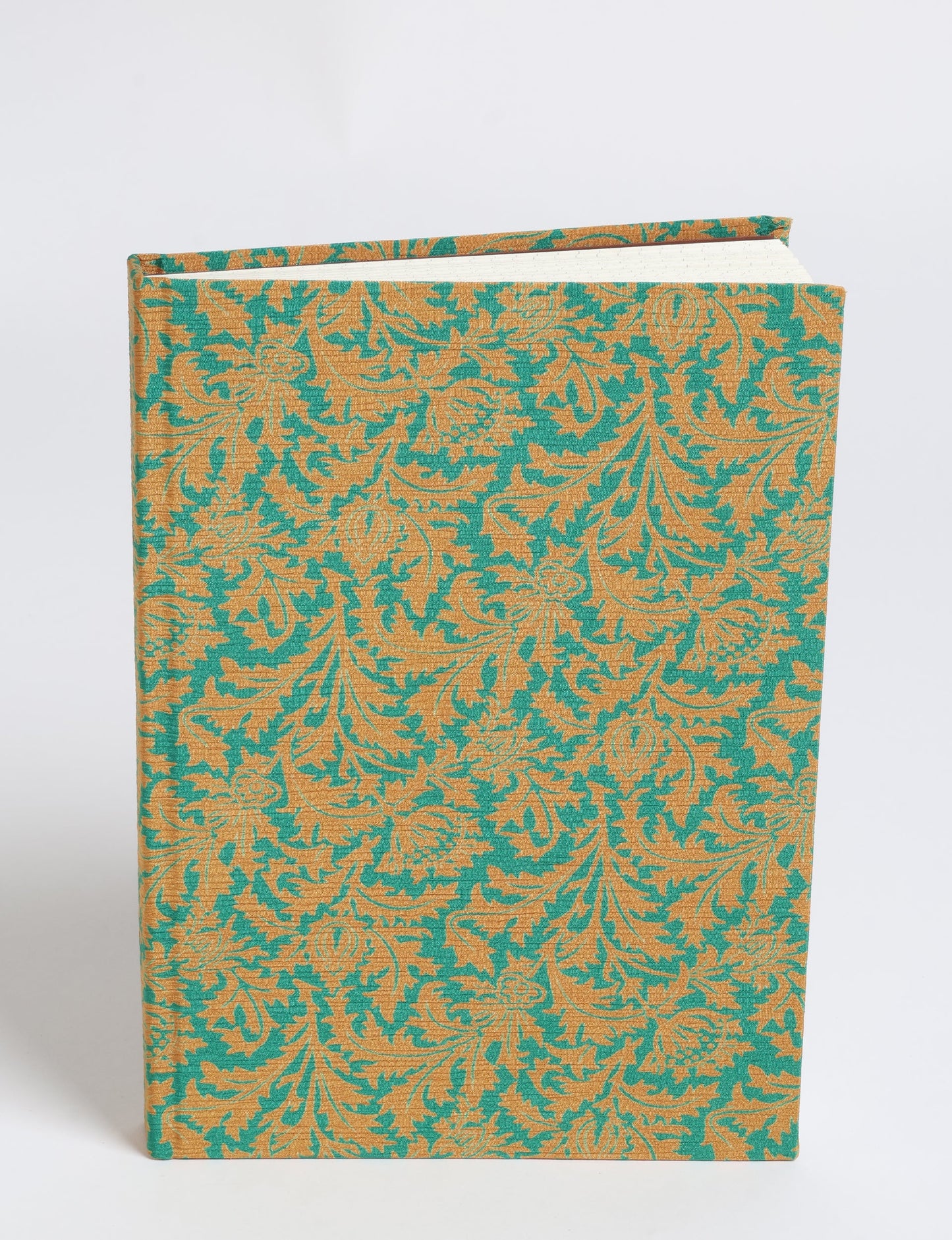 Elevate your scribbling experience with our A5 hardcover notebook, an epitome of green fashion. Sustainable and upcycled, this notebook features recycled fabric covers and aligns with the ethos of circular fashion. Dive into conscious living with our eco-friendly, recycled material notebook.