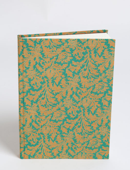 Elevate your scribbling experience with our A5 hardcover notebook, an epitome of green fashion. Sustainable and upcycled, this notebook features recycled fabric covers and aligns with the ethos of circular fashion. Dive into conscious living with our eco-friendly, recycled material notebook.