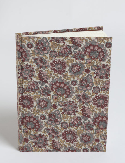 Elevate your scribbling experience with our A5 hardcover notebook, an epitome of green fashion. Sustainable and upcycled, this notebook features recycled fabric covers and aligns with the ethos of circular fashion. Dive into conscious living with our eco-friendly, recycled material notebook.