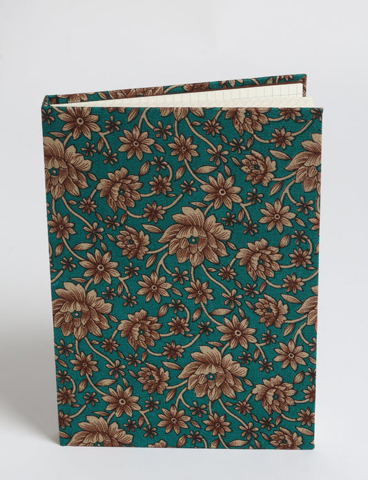 Elevate your scribbling experience with our A5 hardcover notebook, an epitome of green fashion. Sustainable and upcycled, this notebook features recycled fabric covers and aligns with the ethos of circular fashion. Dive into conscious living with our eco-friendly, recycled material notebook.