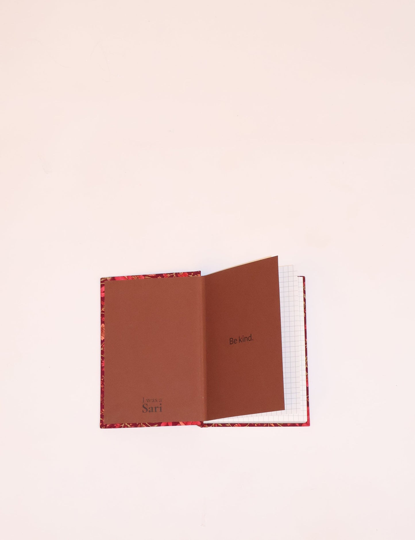 Indulge your creative spirit with our A6 hardcover notebook – a blend of sustainability and style. Made with 100% recycled paper and adorned with pre-loved sari fabric, this eco-conscious notebook encourages mindful note-taking and resonates with the principles of eco-friendly fashion.