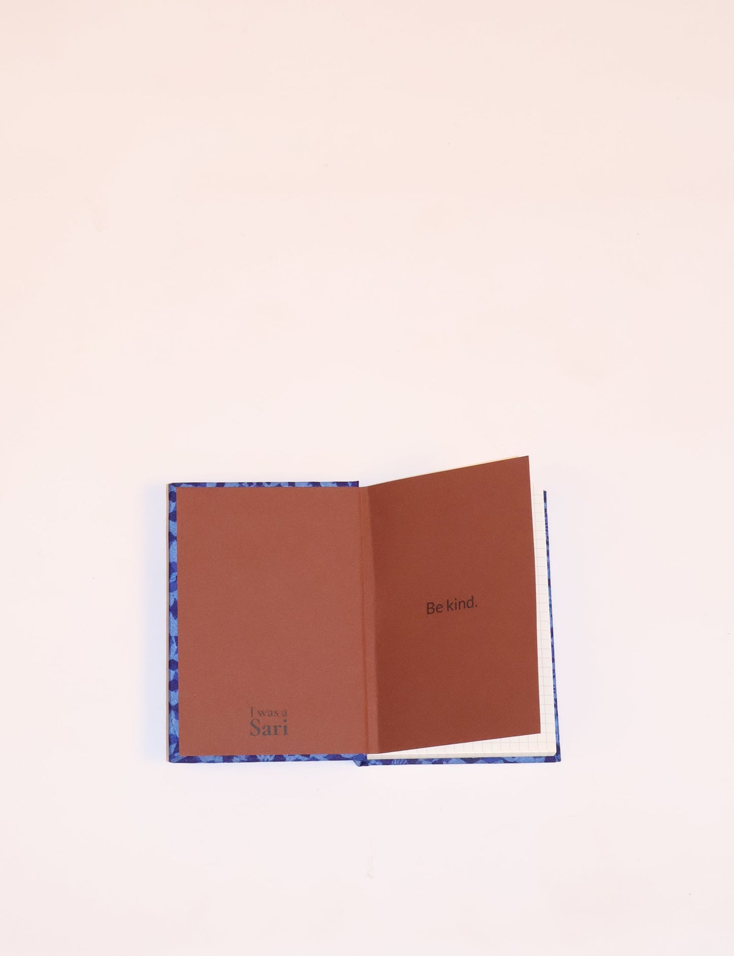 Indulge your creative spirit with our A6 hardcover notebook – a blend of sustainability and style. Made with 100% recycled paper and adorned with pre-loved sari fabric, this eco-conscious notebook encourages mindful note-taking and resonates with the principles of eco-friendly fashion.