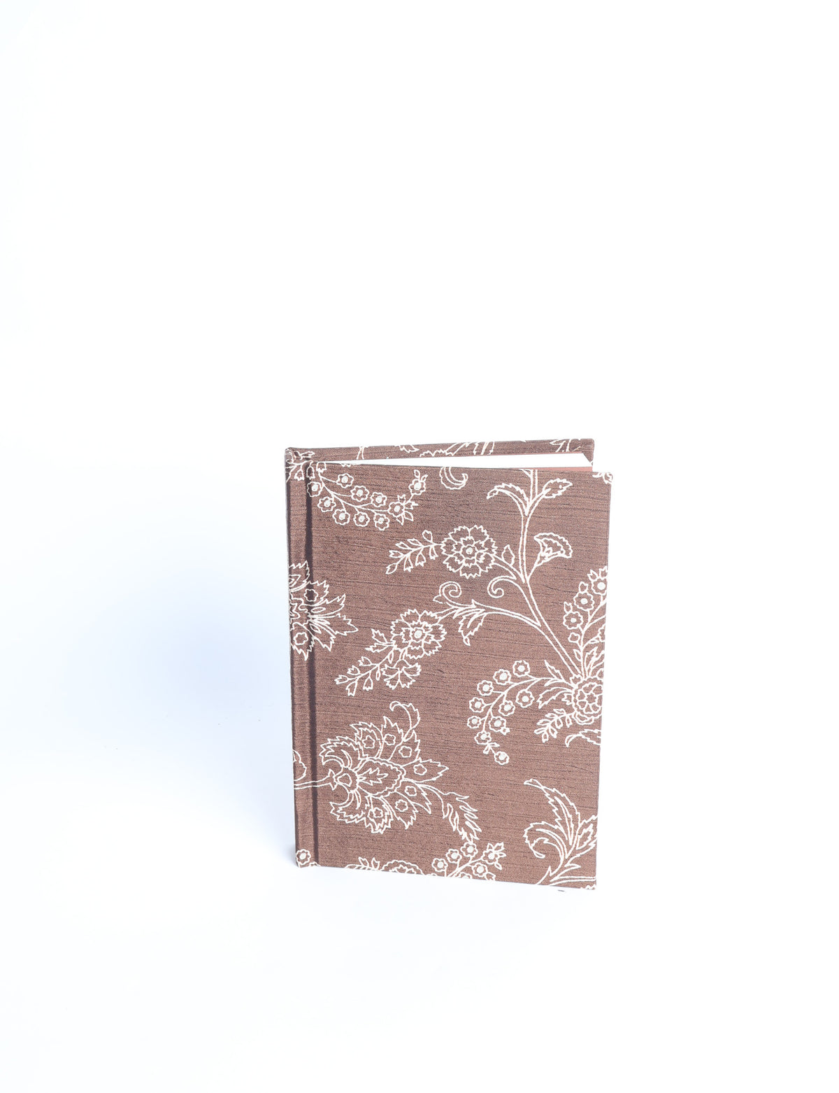 A6 hard cover notebook with teal pre-loved sari fabric cover featuring dark green floral vine pattern, standing upright