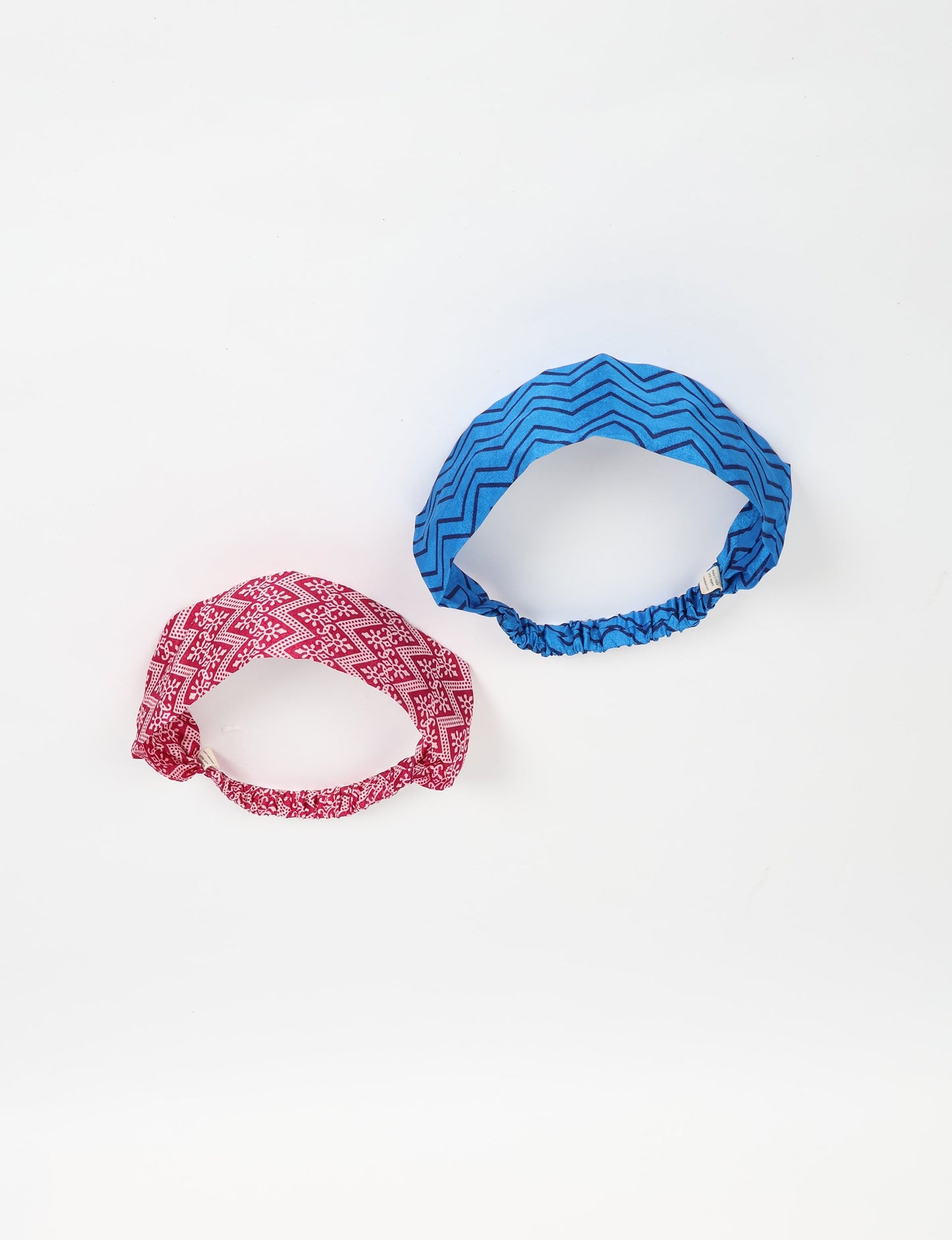 Upcycled sari elastic headband in colorful recycled fabric, handmade with zero waste clothing practices—an example of ethical clothing, fair trade fashion, and eco friendly fashion supporting climate neutral, sustainable women’s clothing.