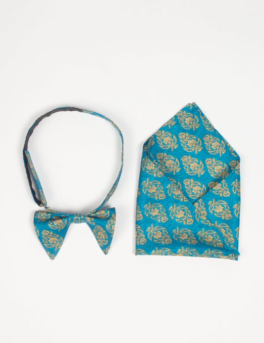 Dapper BOW TIE & POCKET SQUARE SET, ethically handcrafted with lively prints and eye-catching colors. Made by Mumbai-based craftswomen, this ensemble adds excitement to classic formal-wear. Sustainable fashion supporting fair trade, slow fashion, and empowering women artisans. A powerful story of transformation.