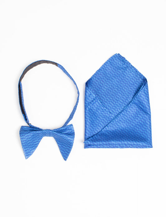 Dapper BOW TIE & POCKET SQUARE SET, ethically handcrafted with lively prints and eye-catching colors. Made by Mumbai-based craftswomen, this ensemble adds excitement to classic formal-wear. Sustainable fashion supporting fair trade, slow fashion, and empowering women artisans. A powerful story of transformation.