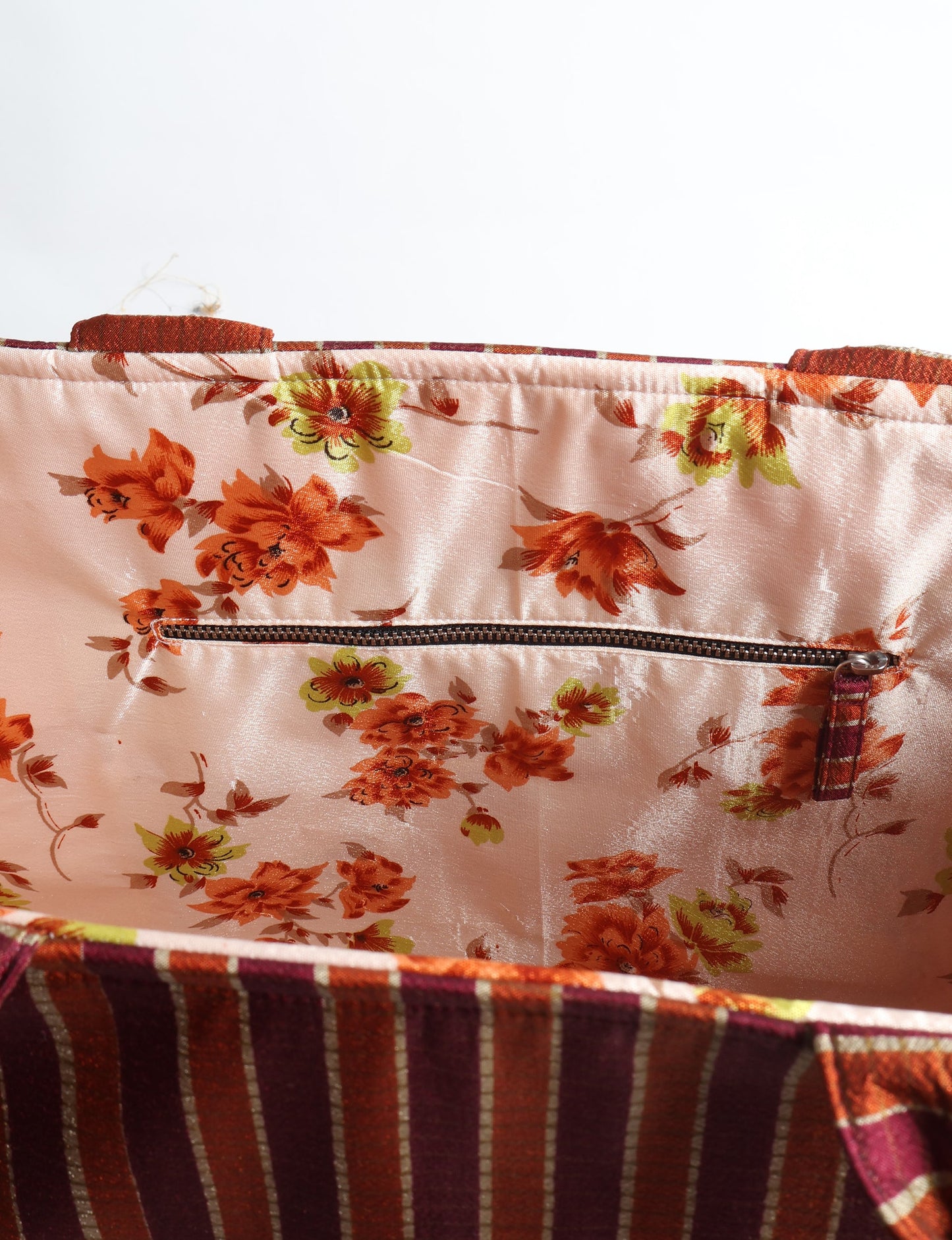 Elevate your eco-friendly style with our Work Tote Bag, a semi-structured, sustainable masterpiece. Soft padded handles, contrast lining, and an inside zipper pocket make it both stylish and functional. Perfect for carrying your laptop and more, this tote stands tall as a symbol of conscious fashion.