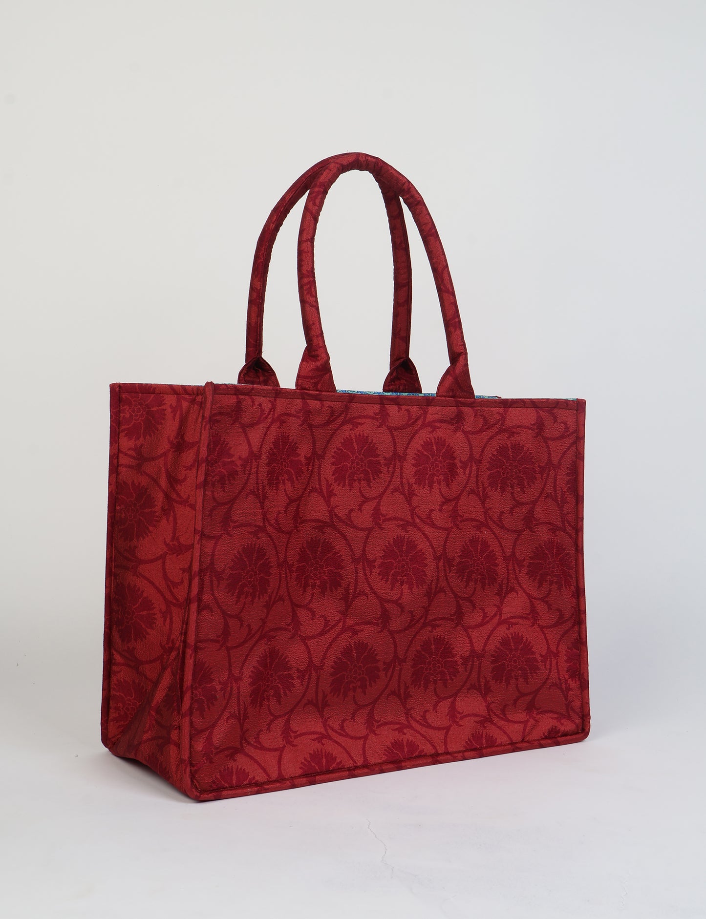 Elevate your eco-friendly style with our Work Tote Bag, a semi-structured, sustainable masterpiece. Soft padded handles, contrast lining, and an inside zipper pocket make it both stylish and functional. Perfect for carrying your laptop and more, this tote stands tall as a symbol of conscious fashion.