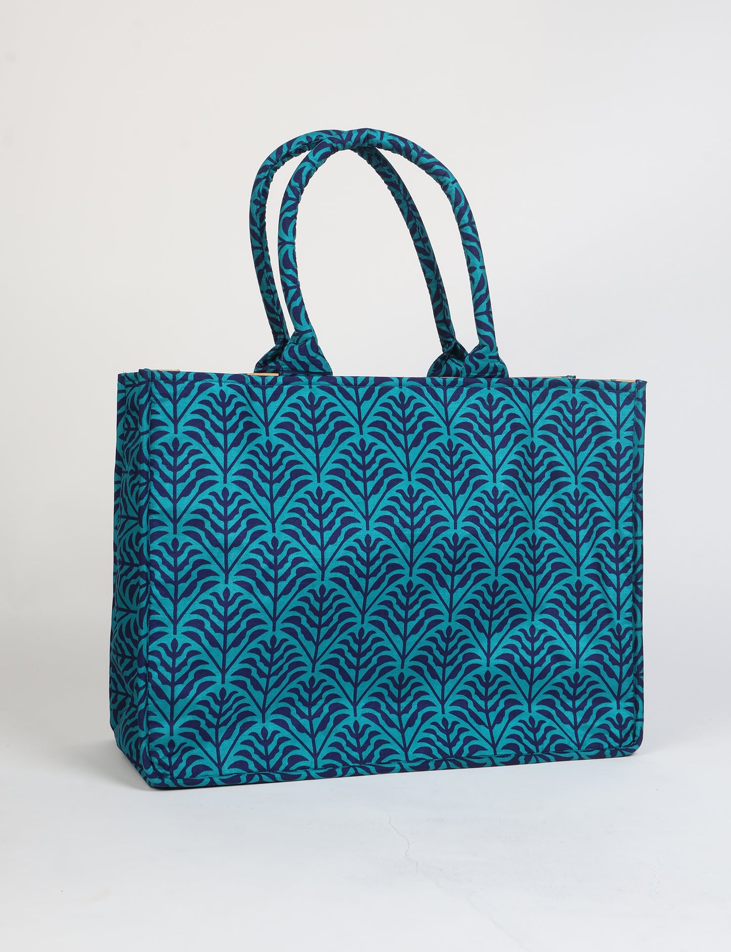 Elevate your eco-friendly style with our Work Tote Bag, a semi-structured, sustainable masterpiece. Soft padded handles, contrast lining, and an inside zipper pocket make it both stylish and functional. Perfect for carrying your laptop and more, this tote stands tall as a symbol of conscious fashion.