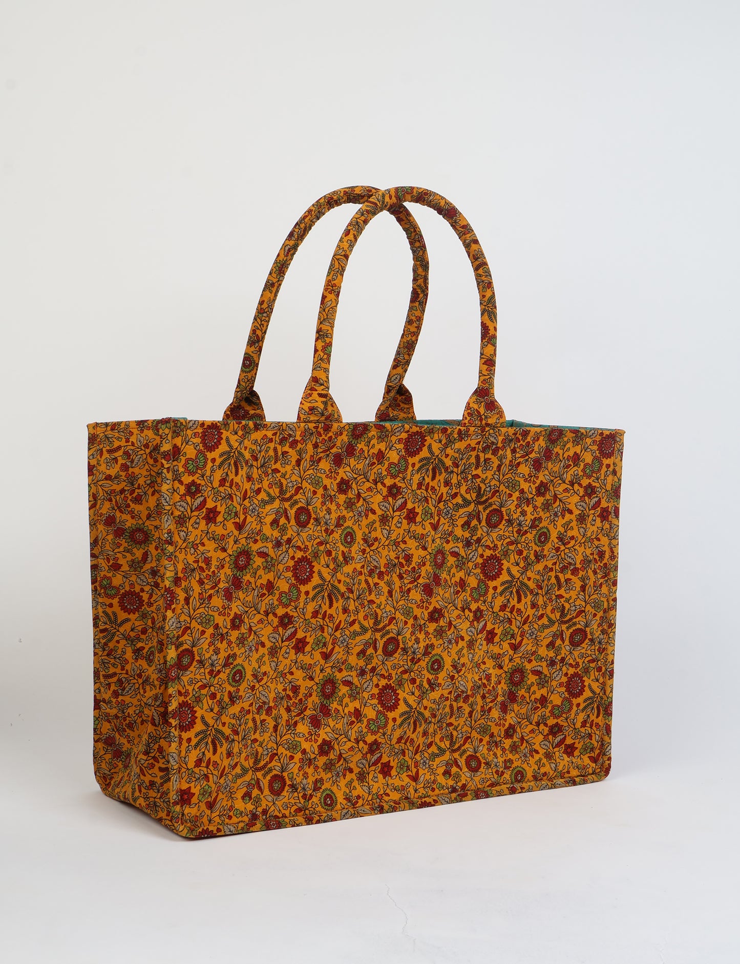 Elevate your eco-friendly style with our Work Tote Bag, a semi-structured, sustainable masterpiece. Soft padded handles, contrast lining, and an inside zipper pocket make it both stylish and functional. Perfect for carrying your laptop and more, this tote stands tall as a symbol of conscious fashion.