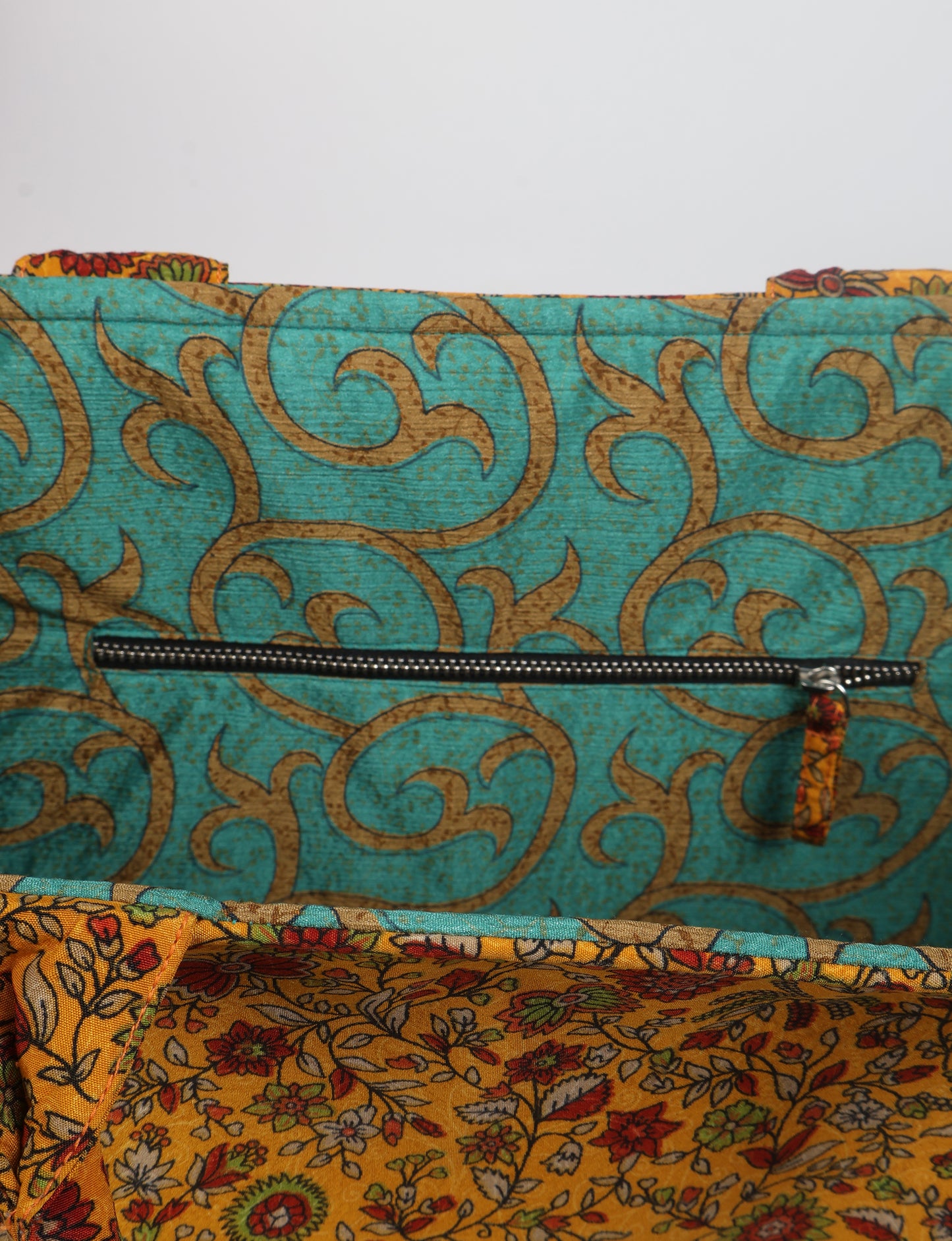 Elevate your eco-friendly style with our Work Tote Bag, a semi-structured, sustainable masterpiece. Soft padded handles, contrast lining, and an inside zipper pocket make it both stylish and functional. Perfect for carrying your laptop and more, this tote stands tall as a symbol of conscious fashion.