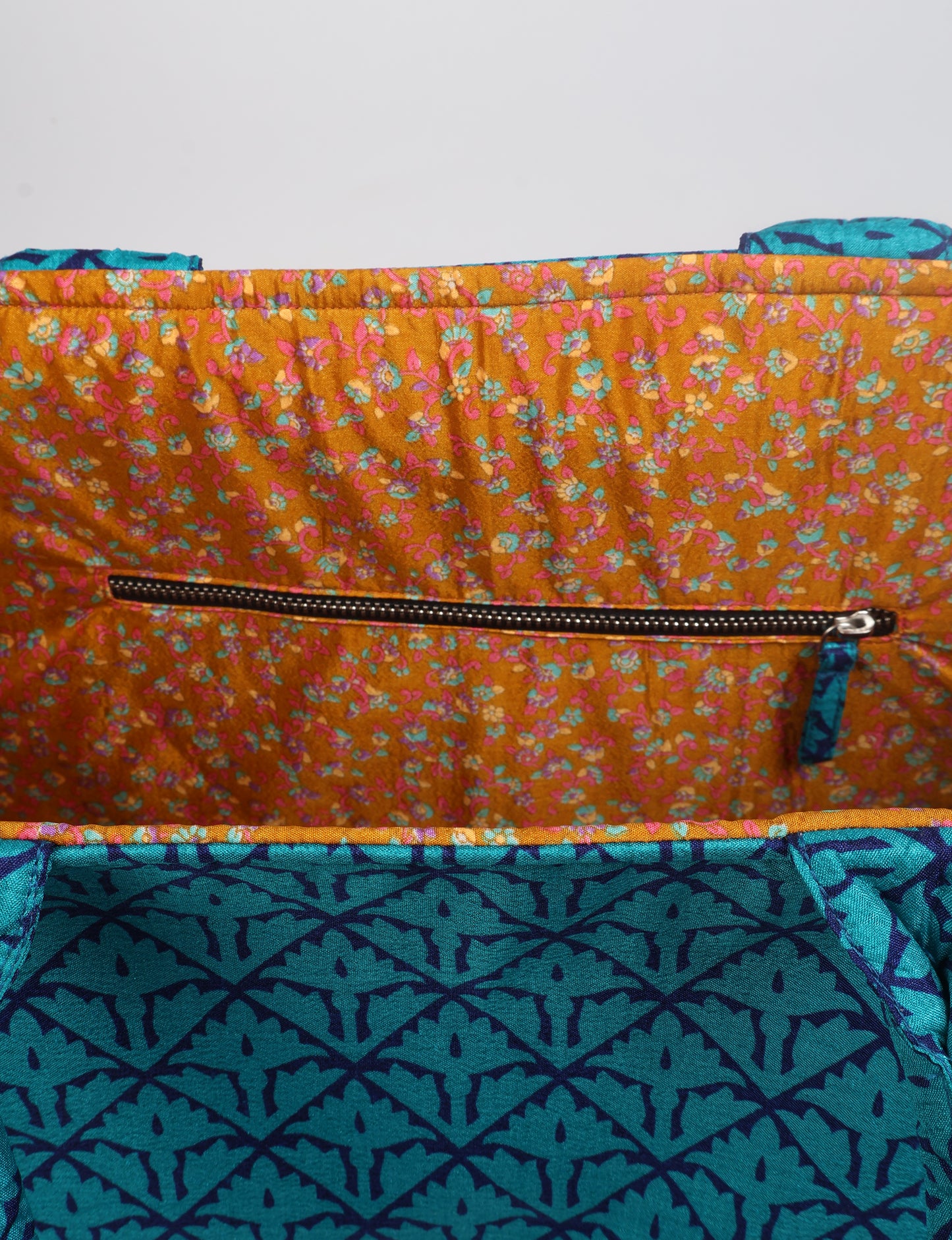 Elevate your eco-friendly style with our Work Tote Bag, a semi-structured, sustainable masterpiece. Soft padded handles, contrast lining, and an inside zipper pocket make it both stylish and functional. Perfect for carrying your laptop and more, this tote stands tall as a symbol of conscious fashion.