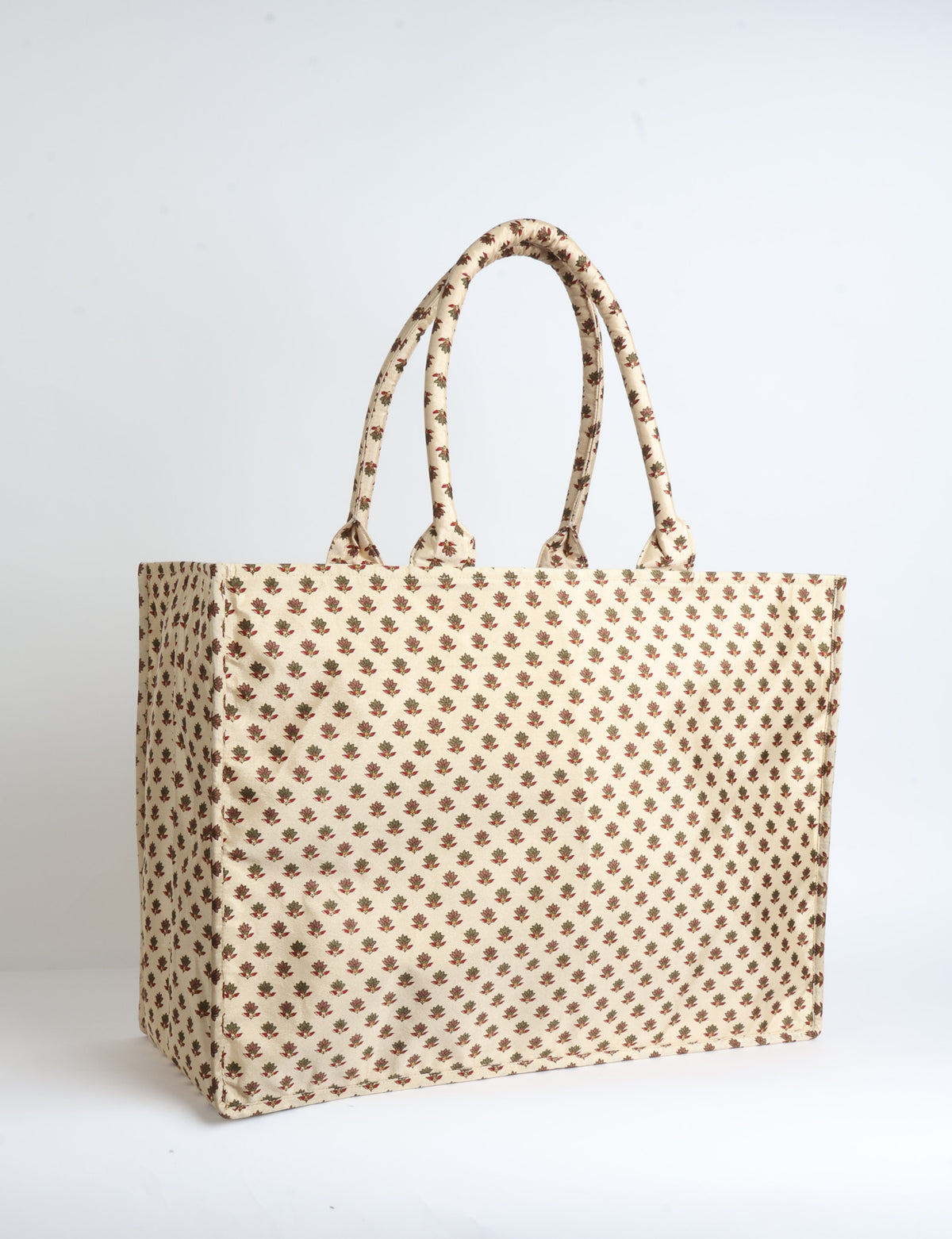Grey floral patterned work tote bag with padded handles, front view, standing upright on white background