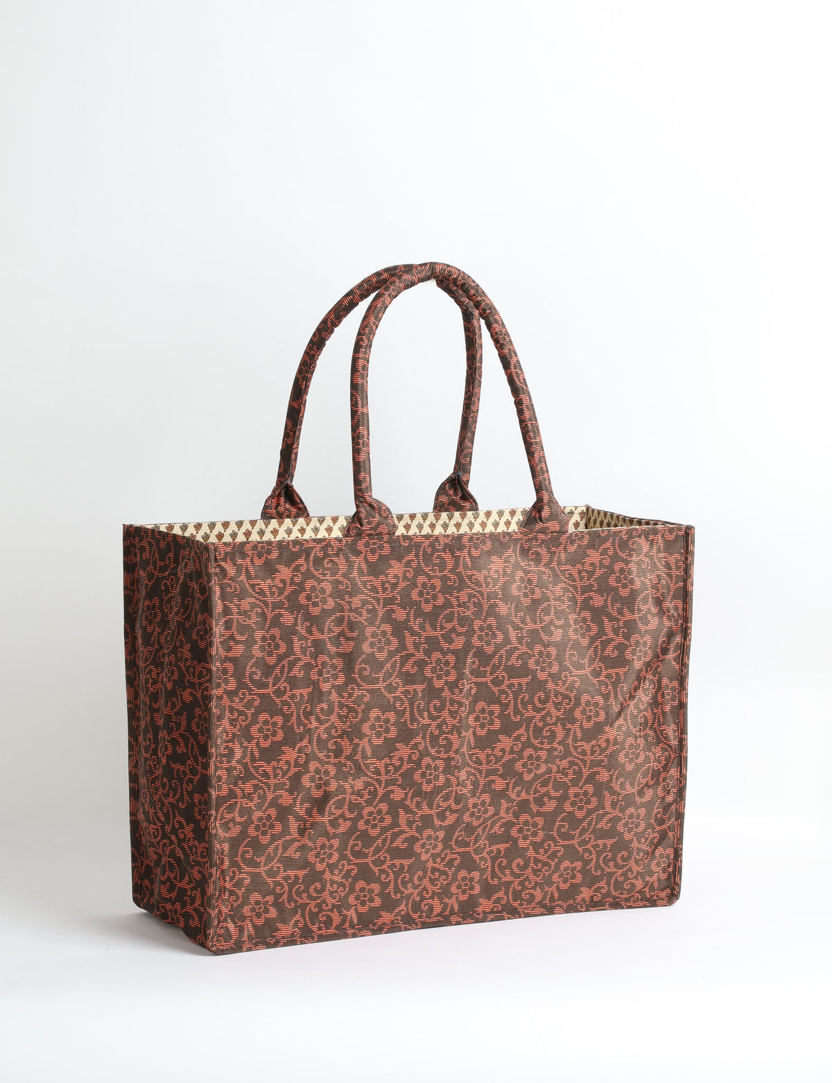 Grey floral patterned work tote bag with padded handles, front view, standing upright on white background