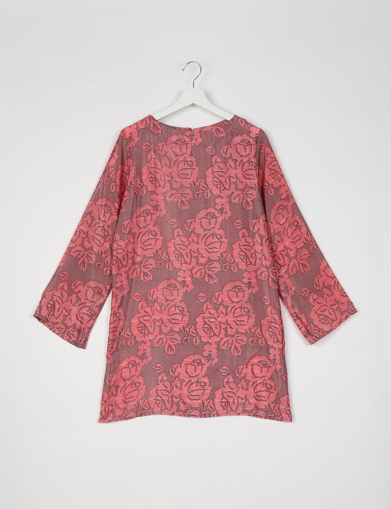 Grey swing dress with pink floral pattern, long sleeves, round neckline, shown from back on white hanger