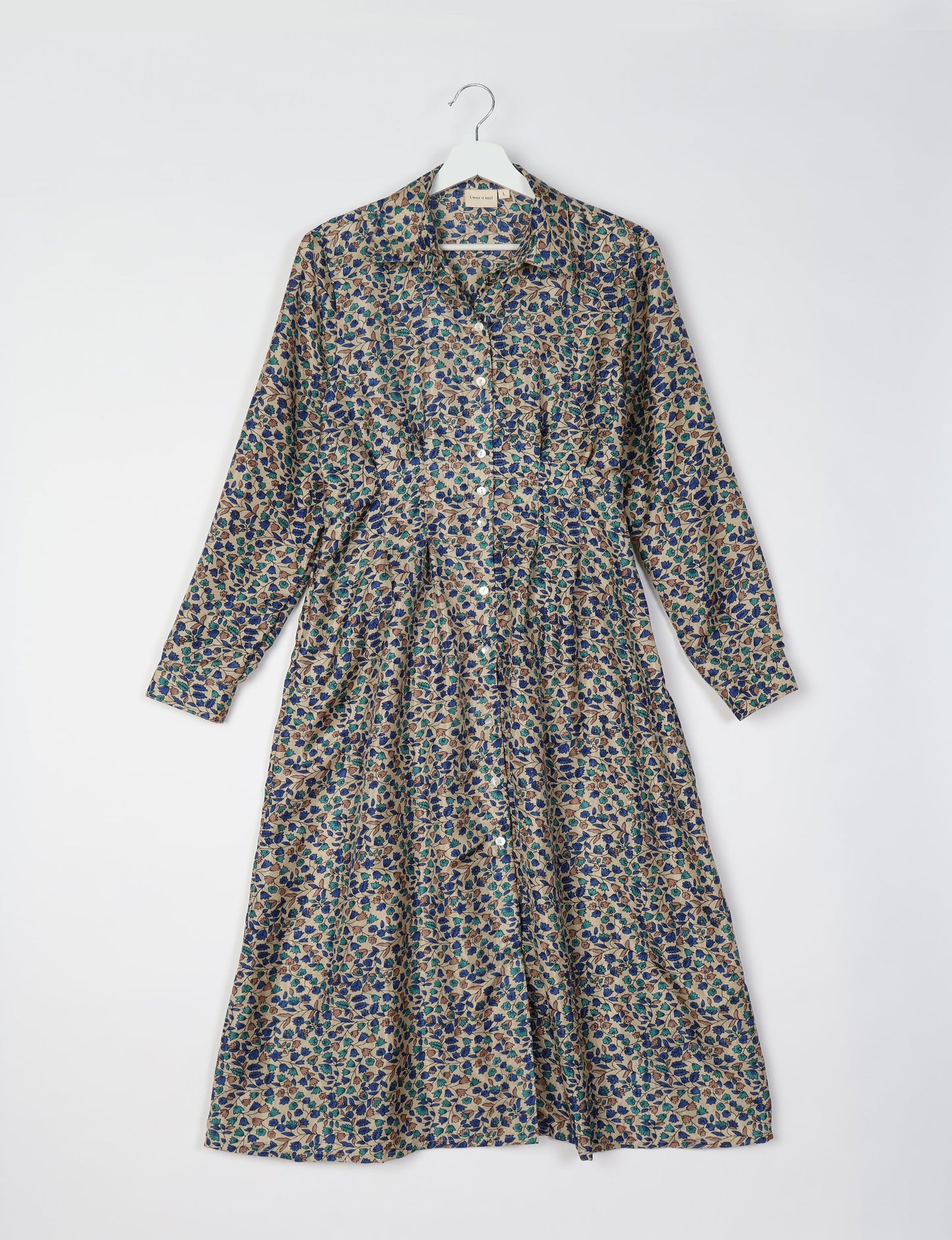 Midi shirt dress with cinched waist, crafted from recycled fabric. A sustainable women's clothing piece representing ethical fashion, eco-friendly products, and upcycled women's clothing.