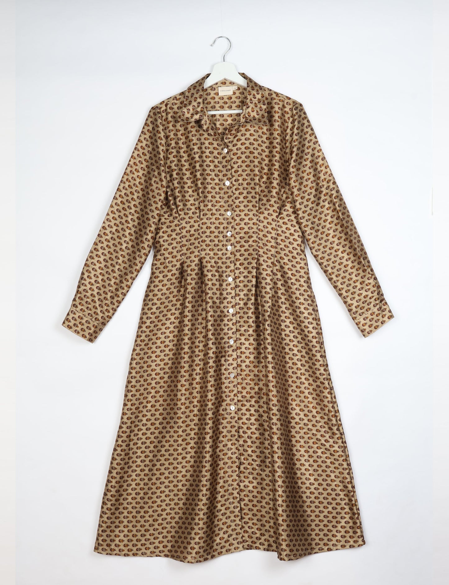 Midi shirt dress with cinched waist, crafted from recycled fabric. A sustainable women's clothing piece representing ethical fashion, eco-friendly products, and upcycled women's clothing.