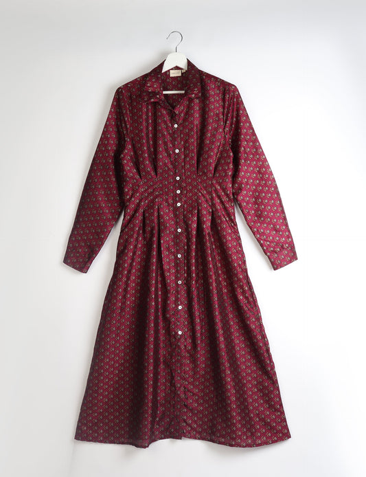 Midi shirt dress with cinched waist, crafted from recycled fabric. A sustainable women's clothing piece representing ethical fashion, eco-friendly products, and upcycled women's clothing.