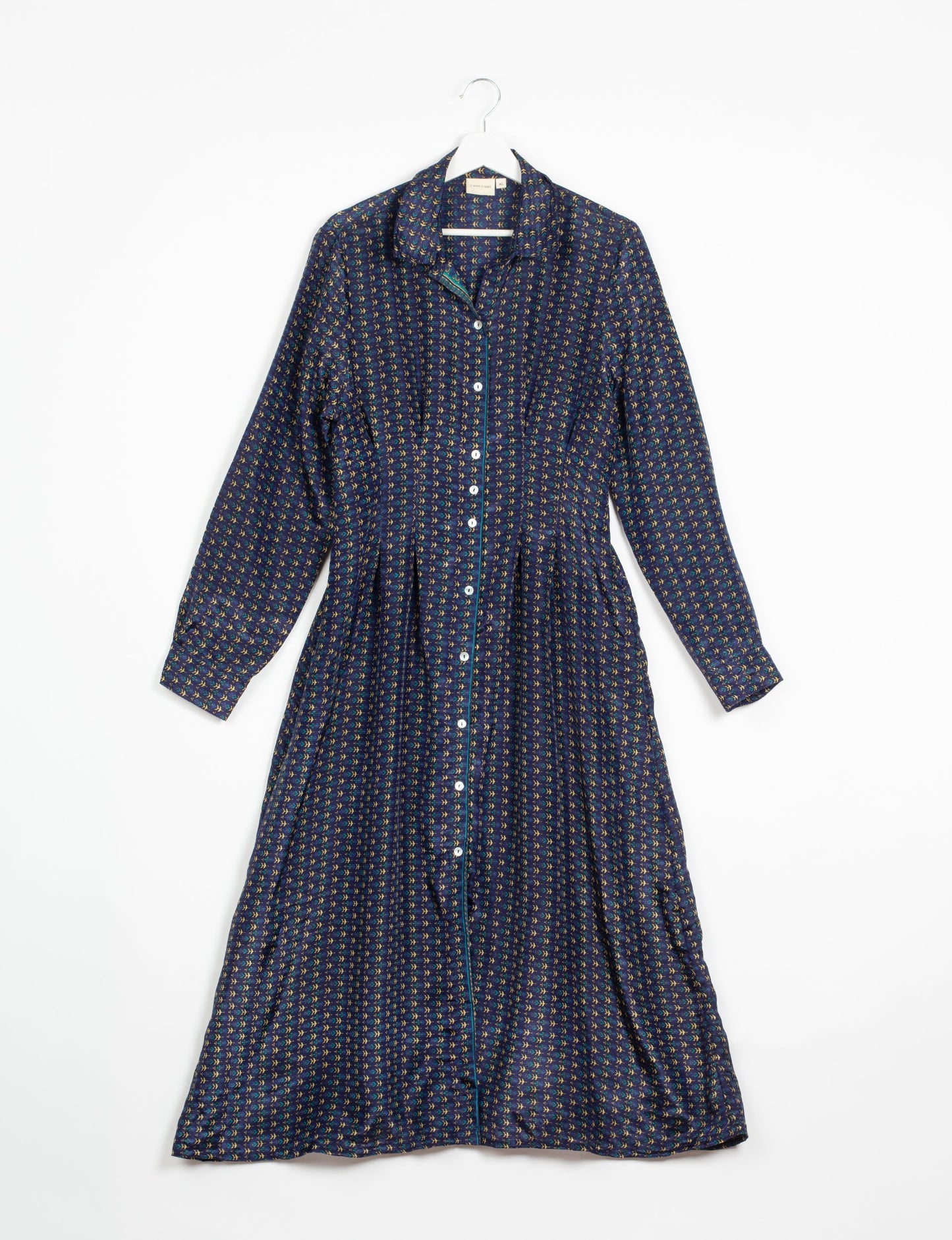 Midi shirt dress with cinched waist, crafted from recycled fabric. A sustainable women's clothing piece representing ethical fashion, eco-friendly products, and upcycled women's clothing.