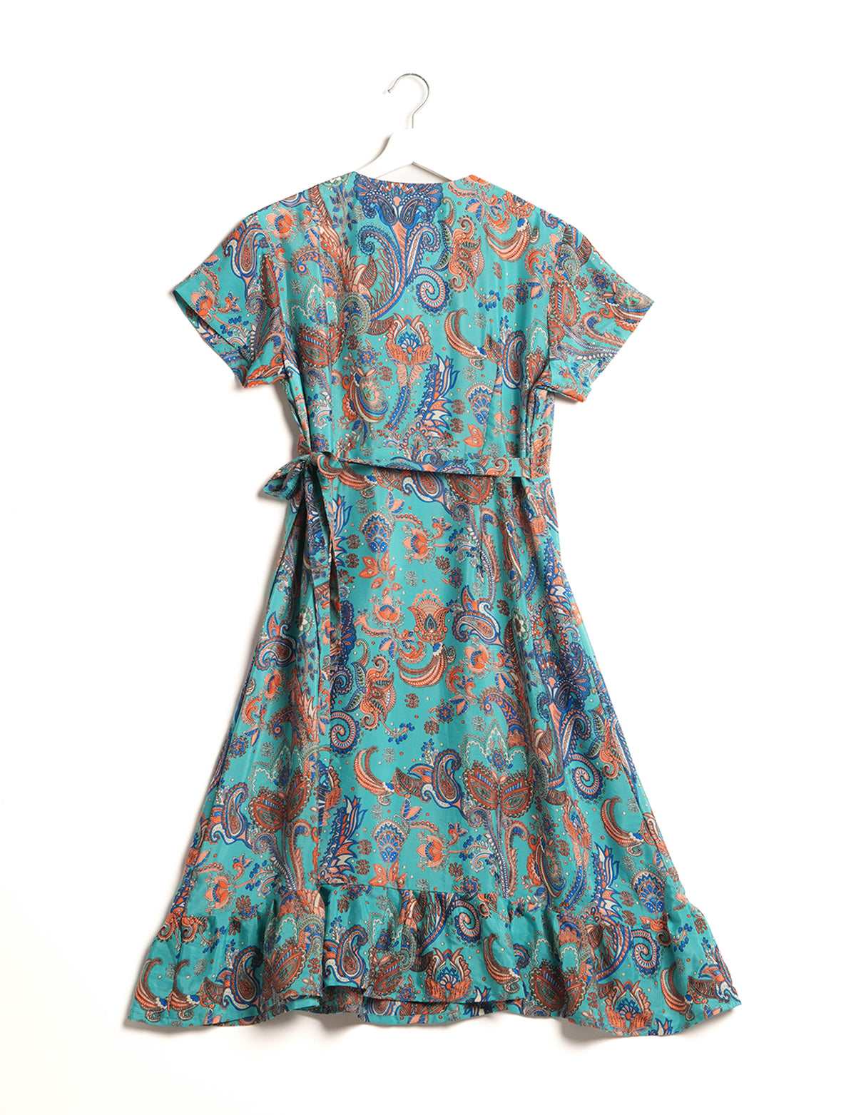 Embrace timeless elegance with our MIDI WRAP DRESS – a midi-length beauty featuring a v-neck, flattery from all angles, and a charming sari belt. Crafted from sustainable materials, this dress embodies ethical clothing and green fashion. Sophisticated with a frill tier at the hem and short cap sleeves, this dress is perfect for any occasion. Tie up the beautifully crafted sari belt on the side for a versatile, stylish, and eco-friendly look.
