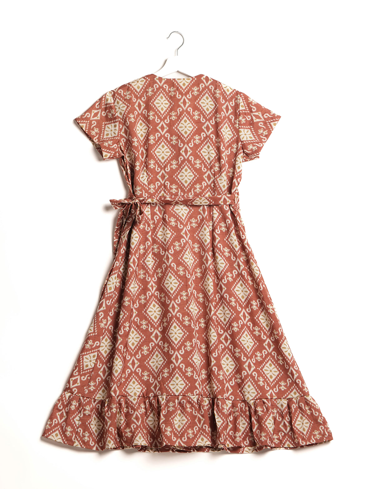 Embrace timeless elegance with our MIDI WRAP DRESS – a midi-length beauty featuring a v-neck, flattery from all angles, and a charming sari belt. Crafted from sustainable materials, this dress embodies ethical clothing and green fashion. Sophisticated with a frill tier at the hem and short cap sleeves, this dress is perfect for any occasion. Tie up the beautifully crafted sari belt on the side for a versatile, stylish, and eco-friendly look.