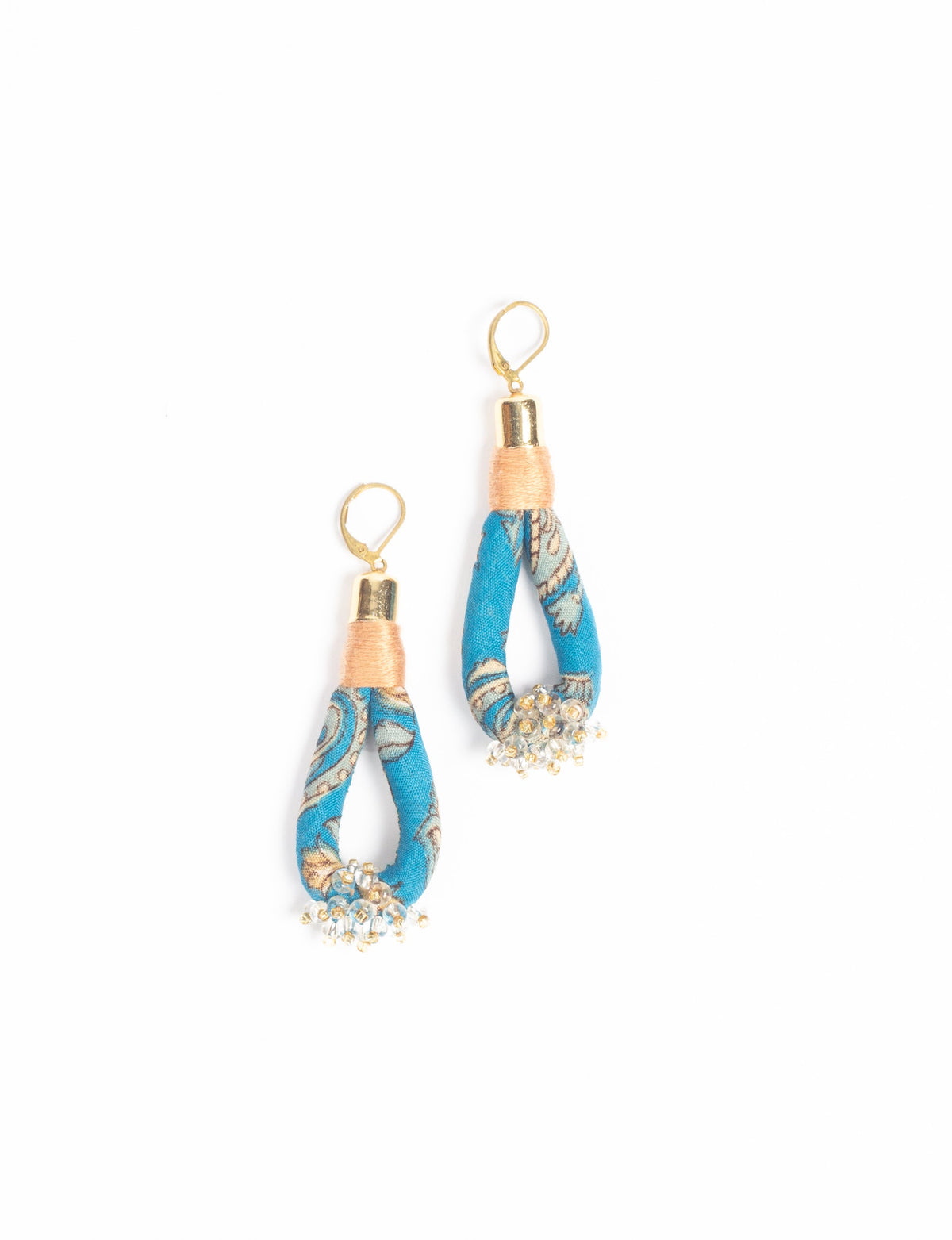 Blue floral fabric loop drop earrings with gold-tone hooks and small clear bead clusters at the bottom