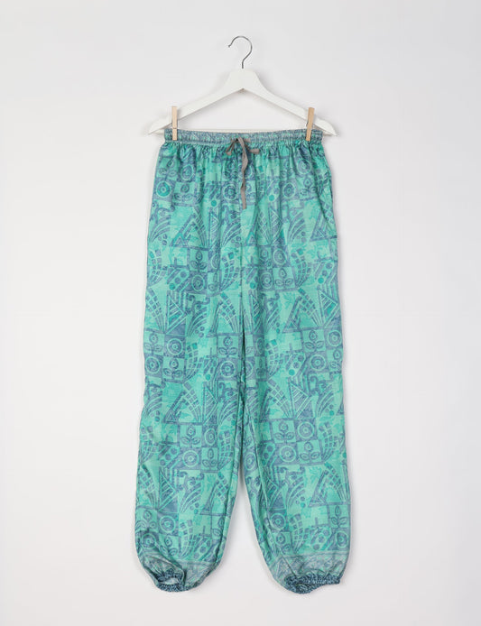 Comfortable and sustainable JOGGER PANTS, pull-on style crafted from eco-materials. Elastic drawstring waist, cotton twill tape, elasticated hems, and slant pockets for style and functionality. Make a positive impact on people and the planet with your fashion choices.