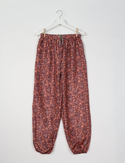 Comfortable and sustainable JOGGER PANTS, pull-on style crafted from eco-materials. Elastic drawstring waist, cotton twill tape, elasticated hems, and slant pockets for style and functionality. Make a positive impact on people and the planet with your fashion choices.