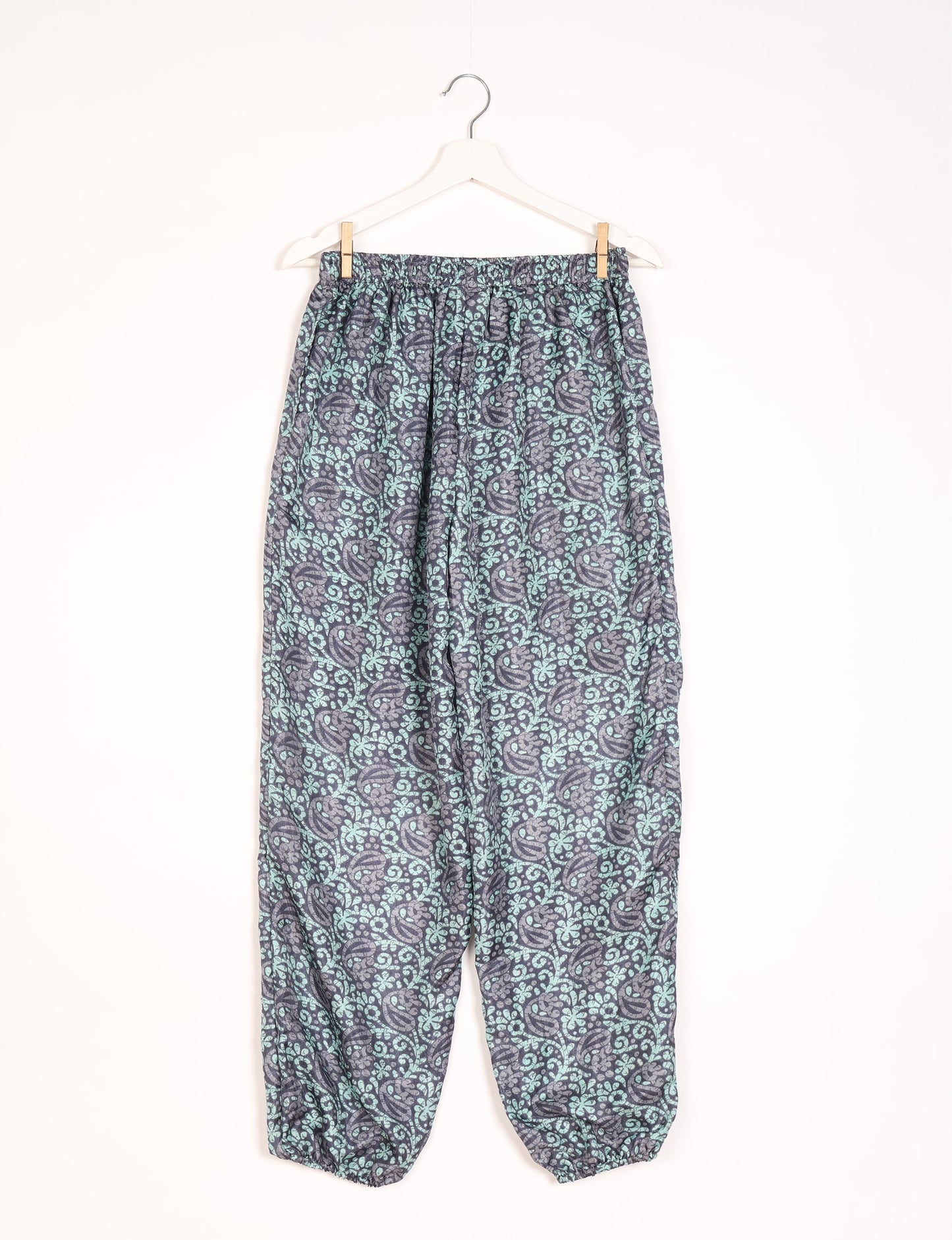 Comfortable and sustainable JOGGER PANTS, pull-on style crafted from eco-materials. Elastic drawstring waist, cotton twill tape, elasticated hems, and slant pockets for style and functionality. Make a positive impact on people and the planet with your fashion choices.