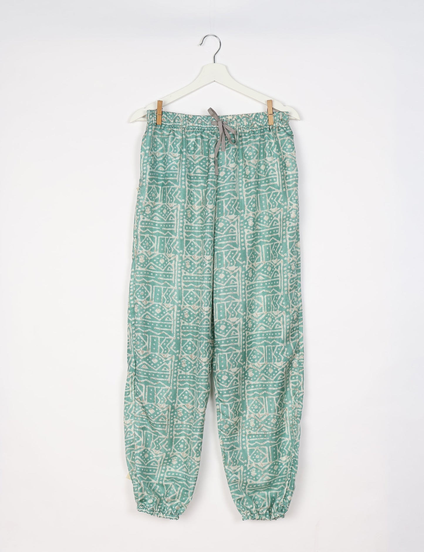 Comfortable and sustainable JOGGER PANTS, pull-on style crafted from eco-materials. Elastic drawstring waist, cotton twill tape, elasticated hems, and slant pockets for style and functionality. Make a positive impact on people and the planet with your fashion choices.