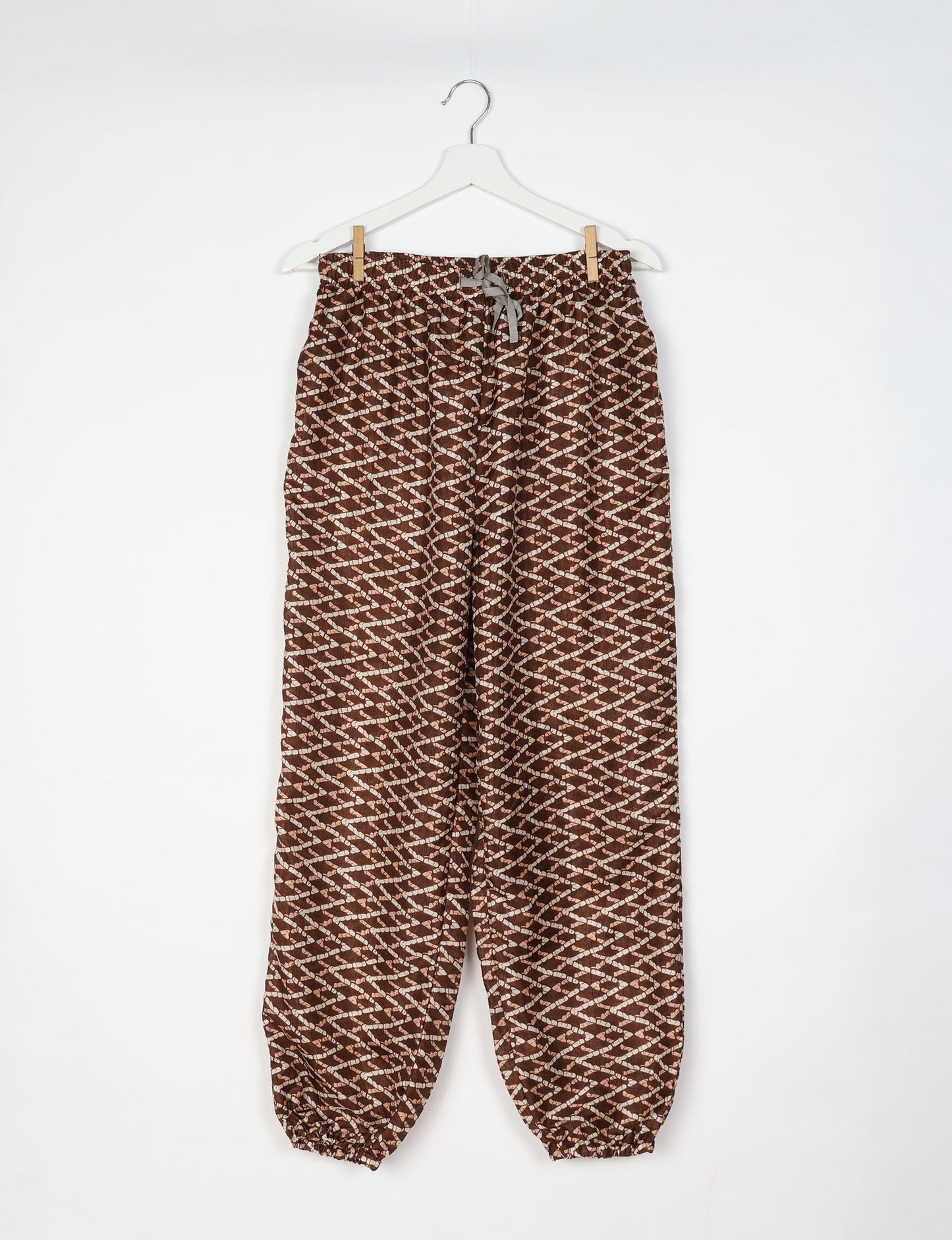 Comfortable and sustainable JOGGER PANTS, pull-on style crafted from eco-materials. Elastic drawstring waist, cotton twill tape, elasticated hems, and slant pockets for style and functionality. Make a positive impact on people and the planet with your fashion choices.