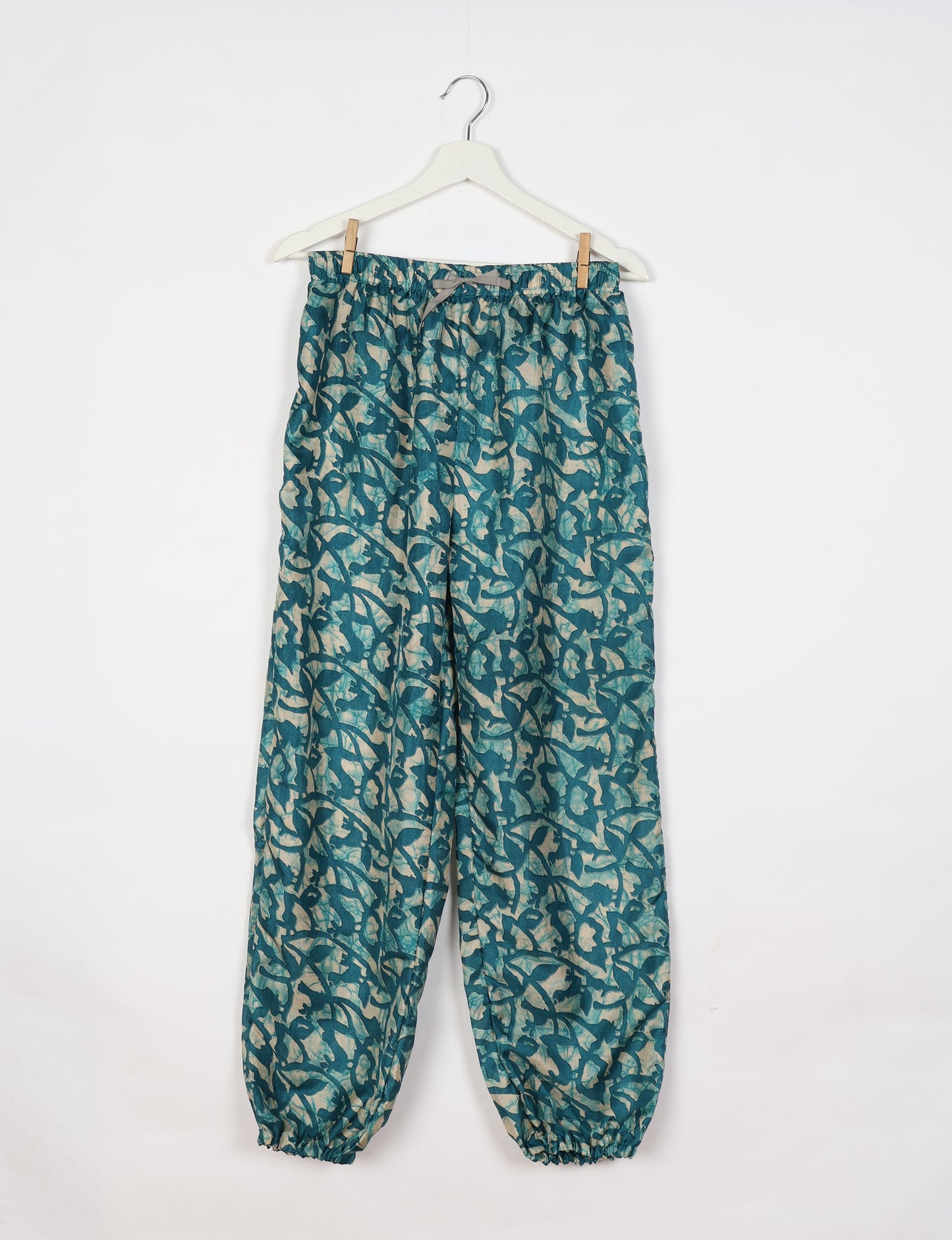 Comfortable and sustainable JOGGER PANTS, pull-on style crafted from eco-materials. Elastic drawstring waist, cotton twill tape, elasticated hems, and slant pockets for style and functionality. Make a positive impact on people and the planet with your fashion choices.