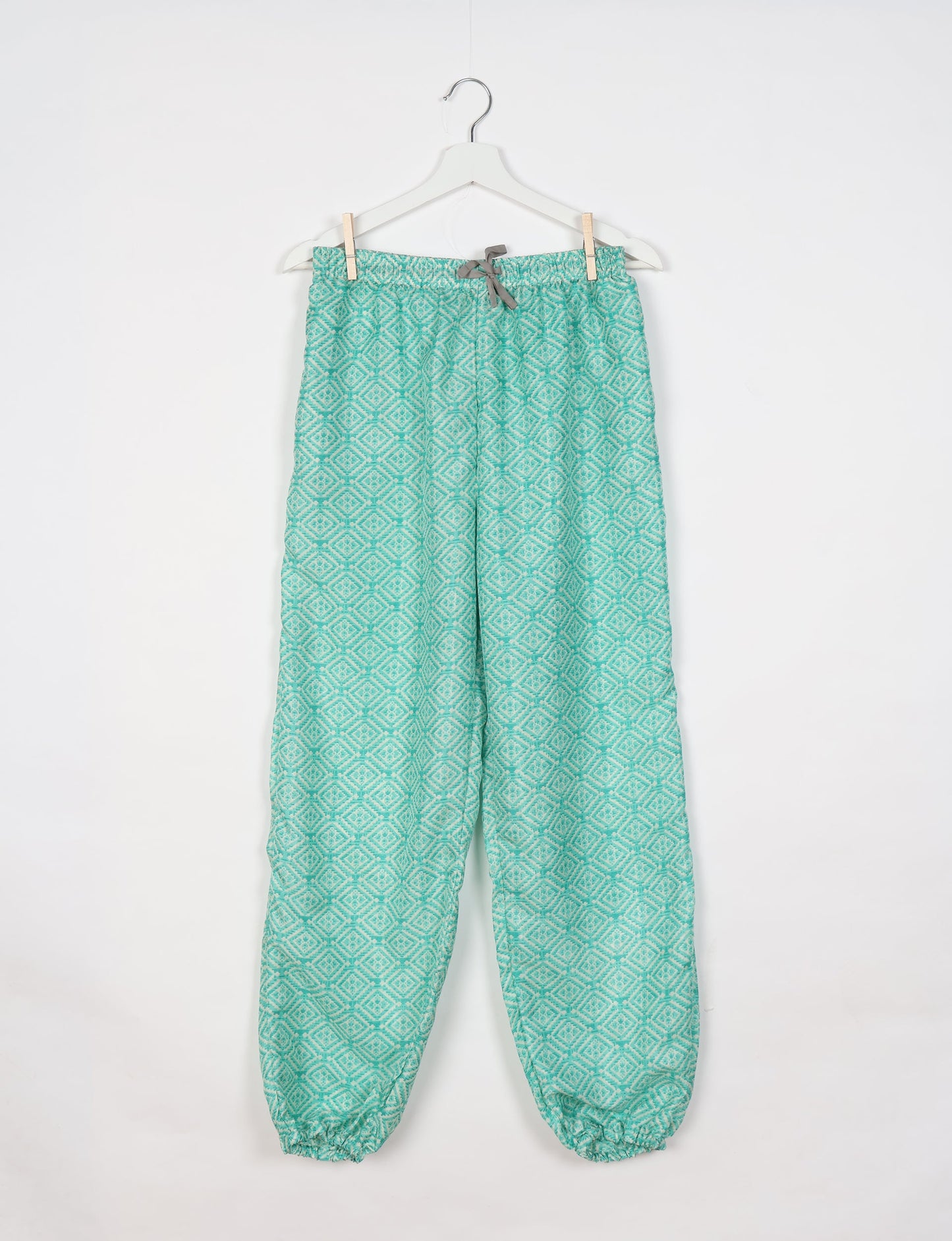 Comfortable and sustainable JOGGER PANTS, pull-on style crafted from eco-materials. Elastic drawstring waist, cotton twill tape, elasticated hems, and slant pockets for style and functionality. Make a positive impact on people and the planet with your fashion choices.