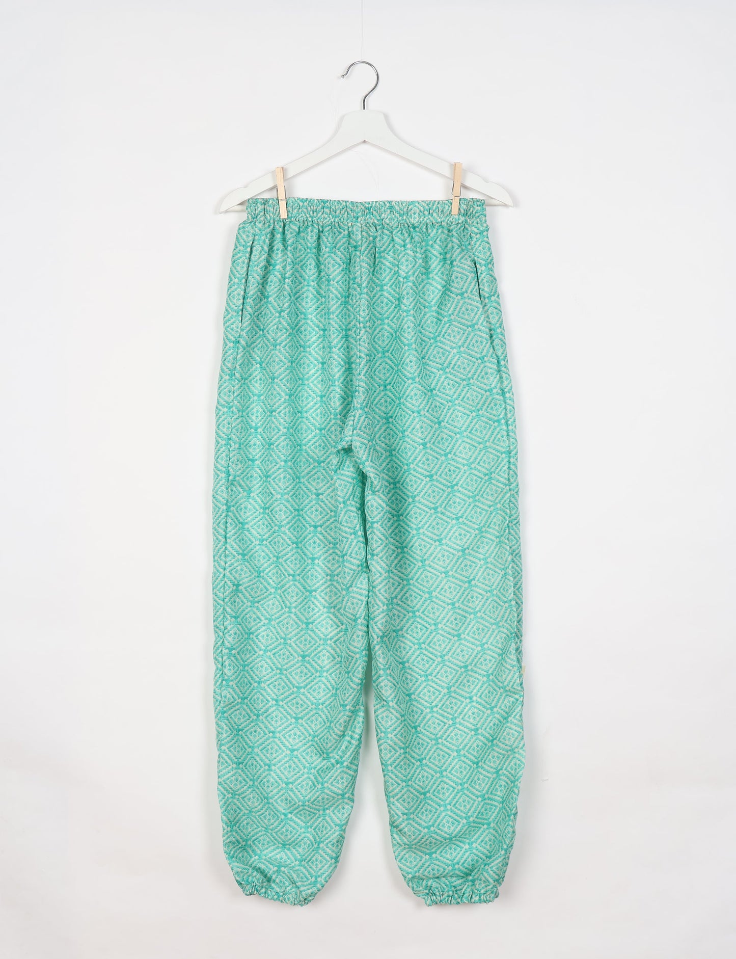 Comfortable and sustainable JOGGER PANTS, pull-on style crafted from eco-materials. Elastic drawstring waist, cotton twill tape, elasticated hems, and slant pockets for style and functionality. Make a positive impact on people and the planet with your fashion choices.