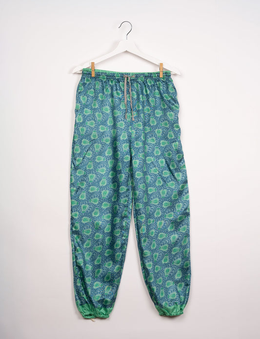 Comfortable and sustainable JOGGER PANTS, pull-on style crafted from eco-materials. Elastic drawstring waist, cotton twill tape, elasticated hems, and slant pockets for style and functionality. Make a positive impact on people and the planet with your fashion choices.