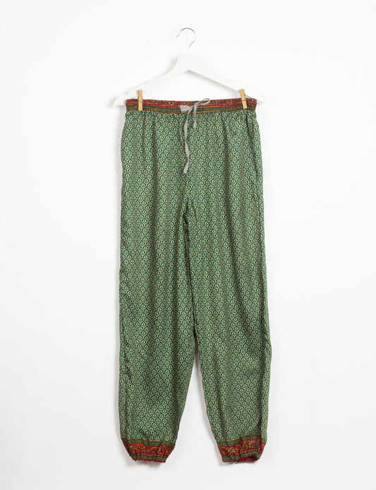 Comfortable and sustainable JOGGER PANTS, pull-on style crafted from eco-materials. Elastic drawstring waist, cotton twill tape, elasticated hems, and slant pockets for style and functionality. Make a positive impact on people and the planet with your fashion choices.