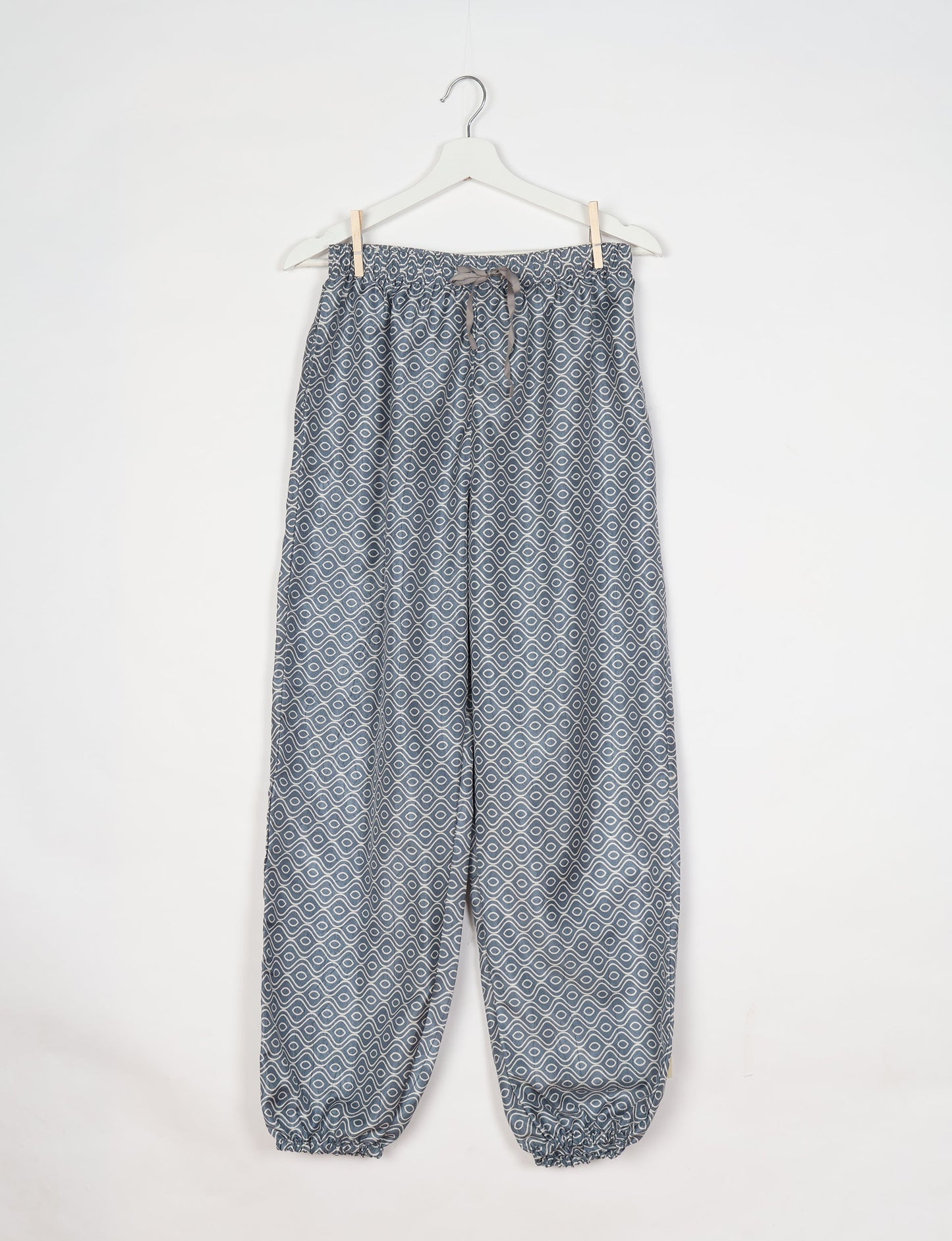 Comfortable and sustainable JOGGER PANTS, pull-on style crafted from eco-materials. Elastic drawstring waist, cotton twill tape, elasticated hems, and slant pockets for style and functionality. Make a positive impact on people and the planet with your fashion choices.