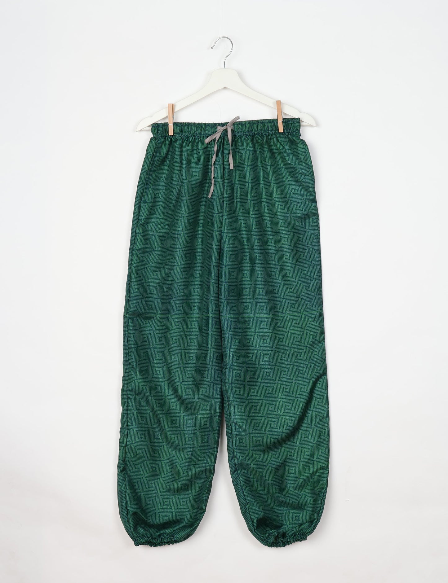 Comfortable and sustainable JOGGER PANTS, pull-on style crafted from eco-materials. Elastic drawstring waist, cotton twill tape, elasticated hems, and slant pockets for style and functionality. Make a positive impact on people and the planet with your fashion choices.