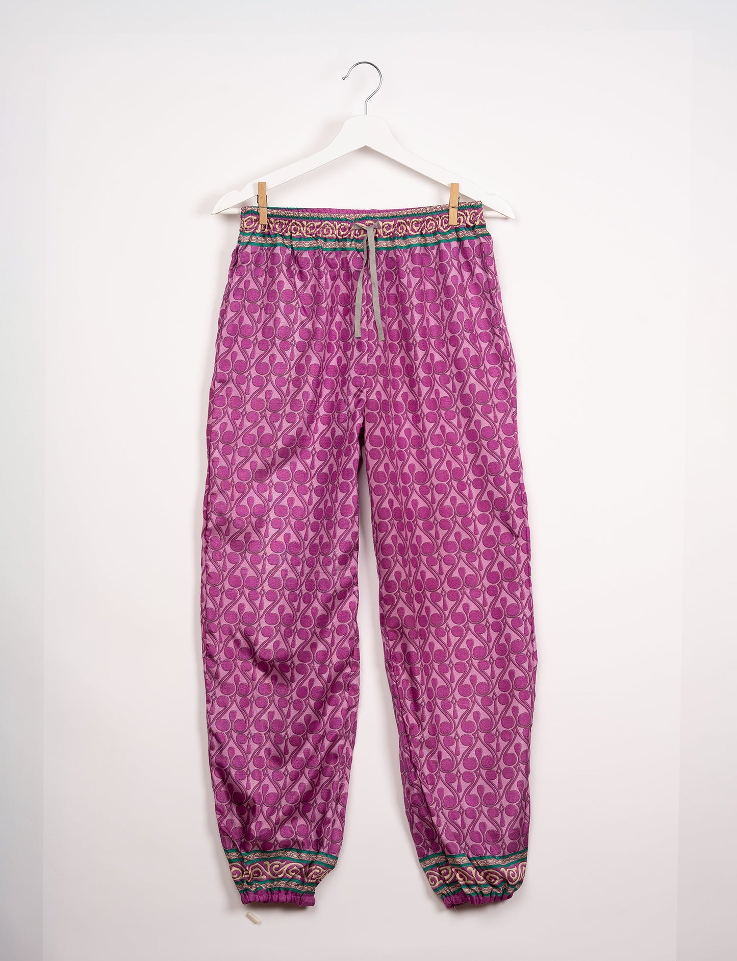 Comfortable and sustainable JOGGER PANTS, pull-on style crafted from eco-materials. Elastic drawstring waist, cotton twill tape, elasticated hems, and slant pockets for style and functionality. Make a positive impact on people and the planet with your fashion choices.