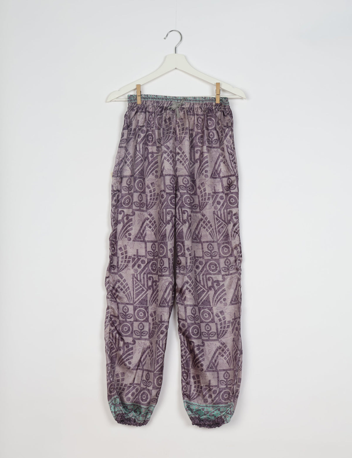Comfortable and sustainable JOGGER PANTS, pull-on style crafted from eco-materials. Elastic drawstring waist, cotton twill tape, elasticated hems, and slant pockets for style and functionality. Make a positive impact on people and the planet with your fashion choices.