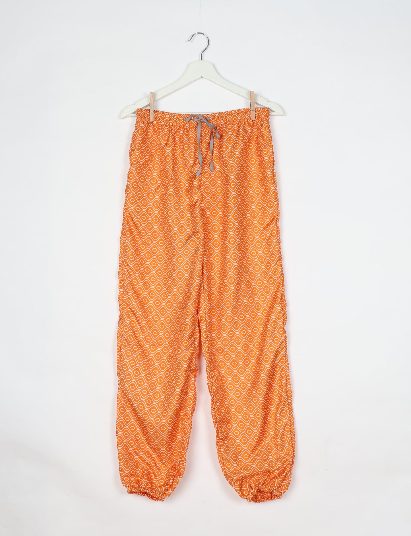 Comfortable and sustainable JOGGER PANTS, pull-on style crafted from eco-materials. Elastic drawstring waist, cotton twill tape, elasticated hems, and slant pockets for style and functionality. Make a positive impact on people and the planet with your fashion choices.